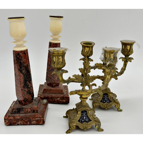 1199 - Pair of French cast ormolu twin branch candlesticks the bases with inset floral enamel panels, 18cm ... 