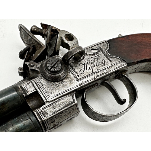 444 - Good quality 19th century twin vertical barrel flintlock pistol, inscribed Hopley, with mahogany gri... 