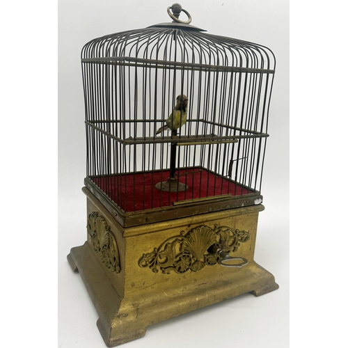 400 - Good antique continental singing bird automaton, feathered bird on a perch in a wire work cage on a ... 