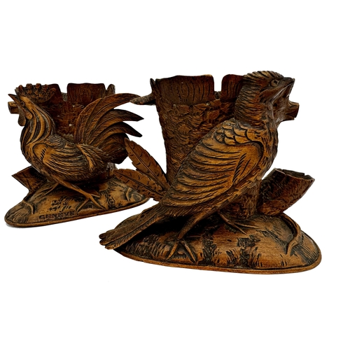 1163 - Pair of blackforest fruitwood spill vases, mounted by a cockerel and hen, the cock inscribed Geneve,... 