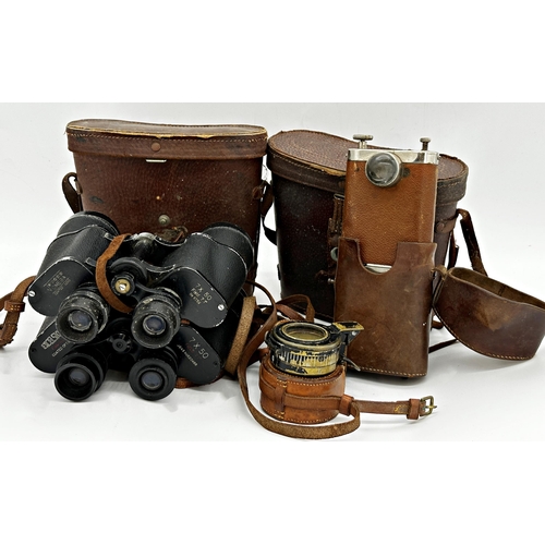 1129 - Mixed field lot to include 1942 military compass, two pairs of binoculars by Excelsior and Omega, an... 