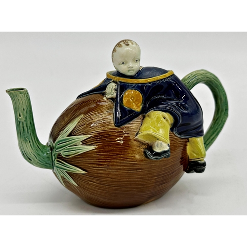 1034 - Joseph Holdcroft majolica teapot, Chinese boy and coconut, 15cm high