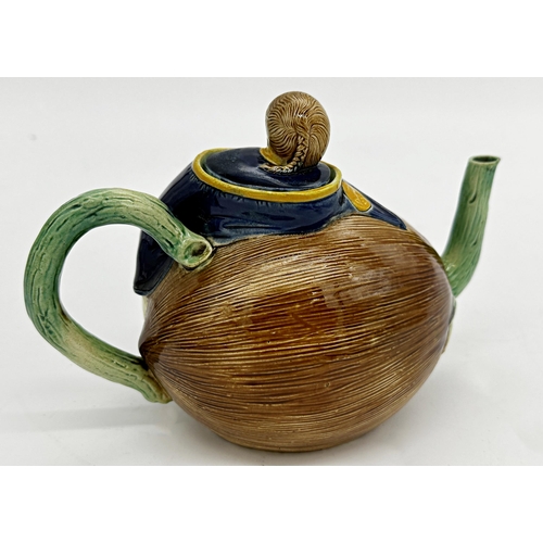 1034 - Joseph Holdcroft majolica teapot, Chinese boy and coconut, 15cm high