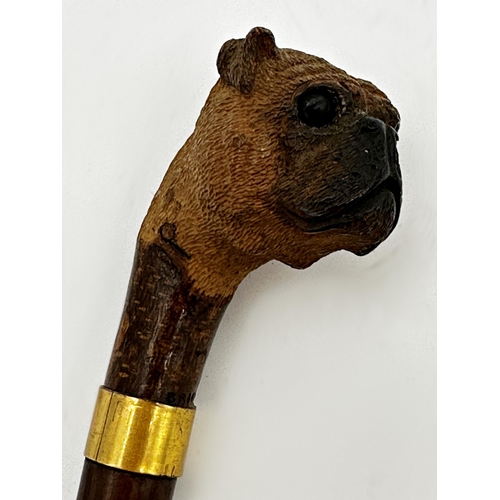 477 - Good quality well carved Brigg pug head walking stick with glass eyes, 92cm long