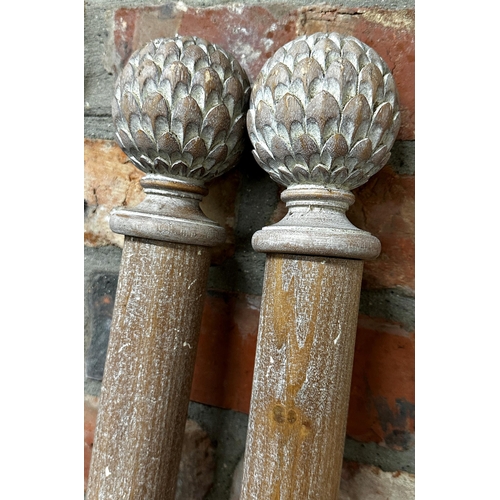 1492 - Pair of good limed wood curtain poles, with floral finials, with rings and brackets, 183cm long