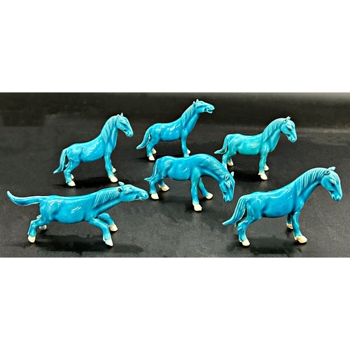 1055 - Set of six turquoise glaze Chinese porcelain horses, the largest 8cm long (6)