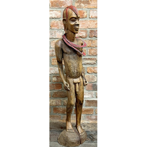 1059 - Tribal interest - Large hardwood carving of a standing nude tribesman, with two bead necklaces, 106c... 