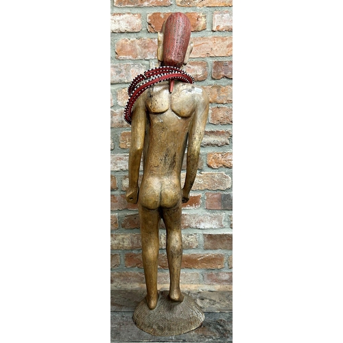 1059 - Tribal interest - Large hardwood carving of a standing nude tribesman, with two bead necklaces, 106c... 