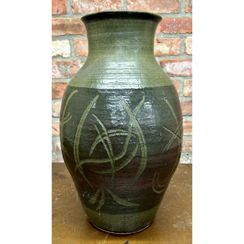 1348 - Large studio pottery baluster vase, with incised decoration, indistinctly signed to base, 43cm high