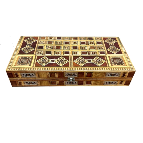 1146 - Early 20th century parquetry backgammon games box, with huge chips and dice, 51 x 50cm (opened)