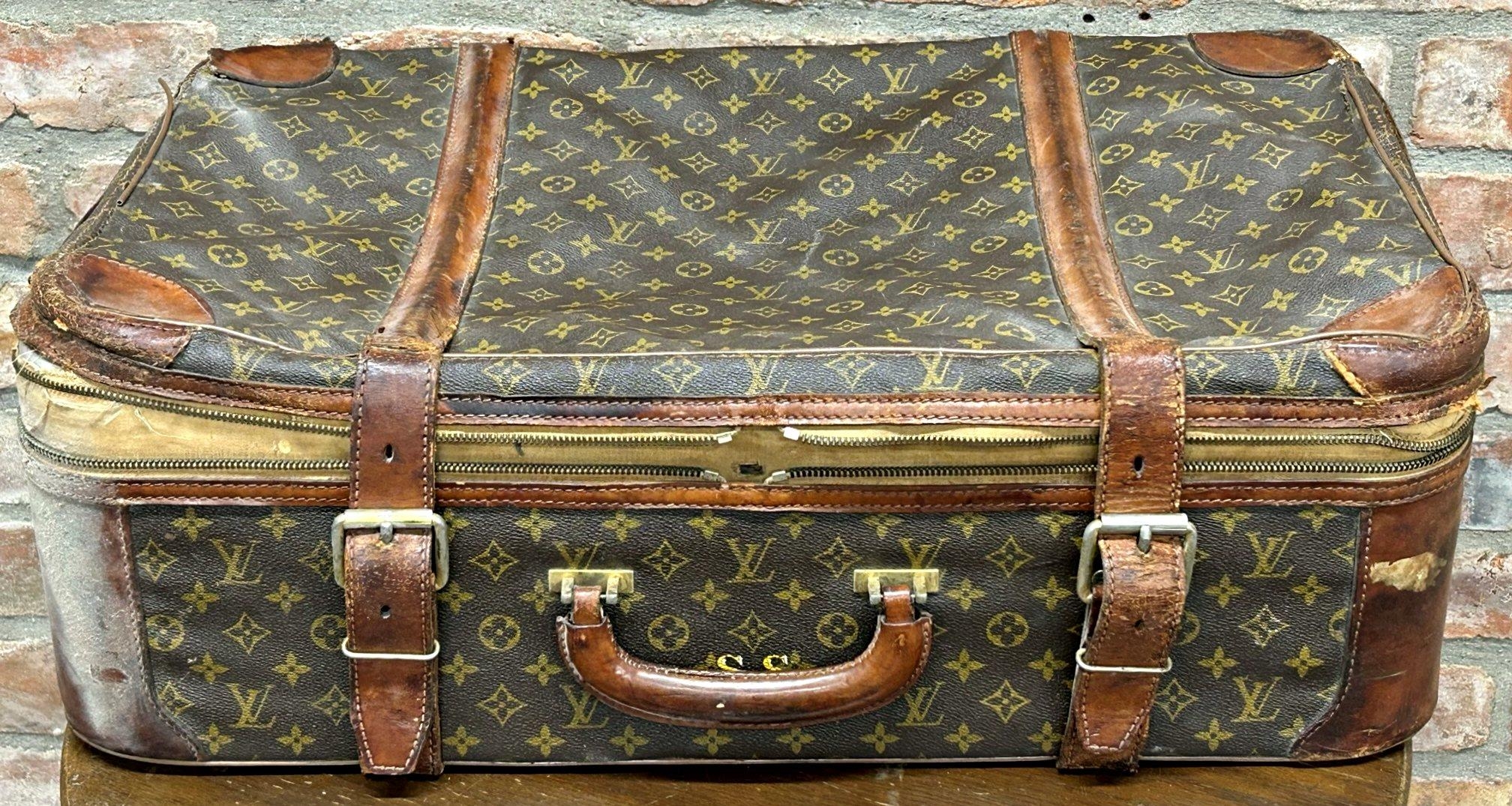 Sold at auction Louis Vuitton Leather and Coated Canvas Hard-side Suitcase  Auction Number 2769T Lot Number 27