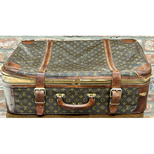 1950s Louis Vuitton suitcase, with leather strap work and canvas