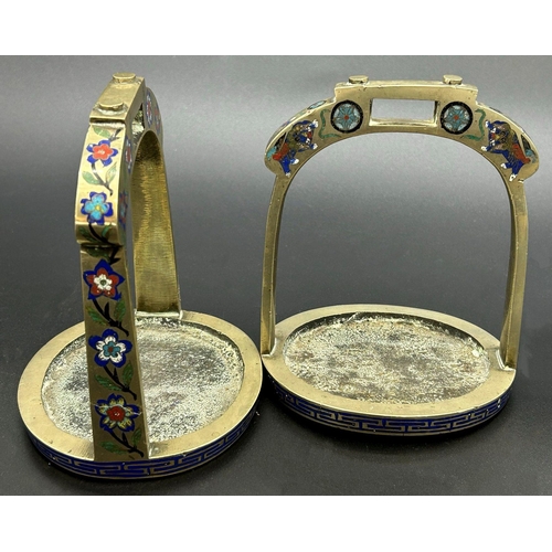 1183 - Good quality pair of enamelled white metal stirrups, with flowers and Greek key boarders, 14cm high