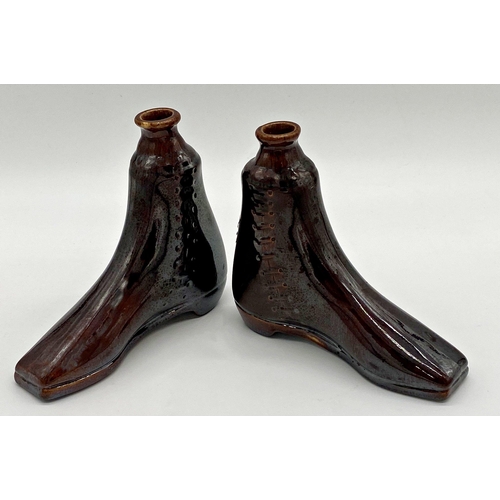 1002 - A pair of novelty brown glazed shoe decanters, 16cm high (2)