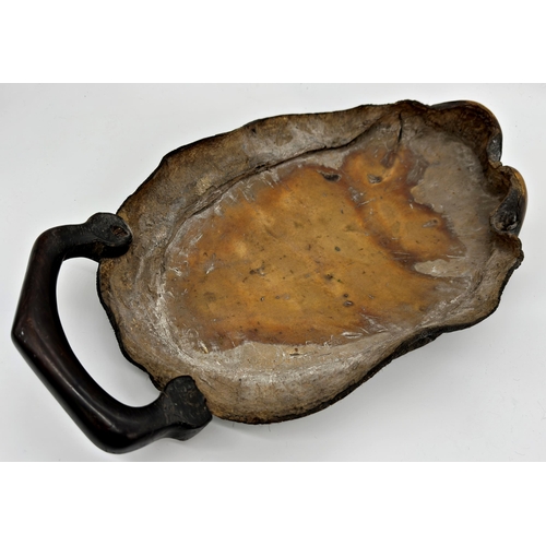 1135 - Taxidermy interest - An elephant foot tray with carved hardwood handle, 52cm x 29cm