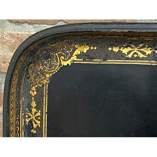 1103 - A good quality Victorian papier-mache ebonised tray with gilt borders, 72cm x 57cm