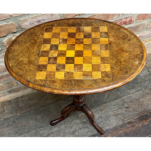 1398 - Victorian walnut games tripod table, 68cm high x 57cm long