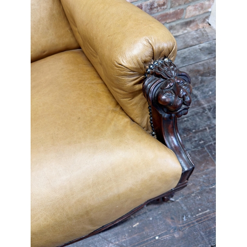 1479 - Exceptional quality late Regency mahogany framed library chair, with tan leather buttoned upholstery... 