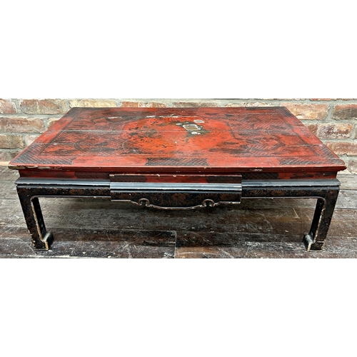 1058 - Antique Chinese red lacquered coffee table, decorated with dragons and griffins, 33cm high x 97cm wi... 