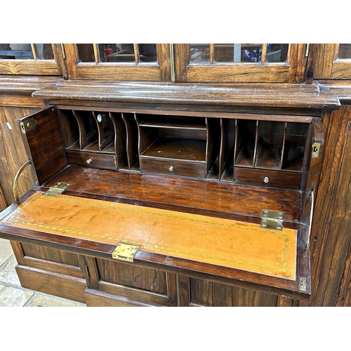 1433 - Good quality Regency rosewood breakfront secretaire bookcase with raised glazed back enclosing a she... 