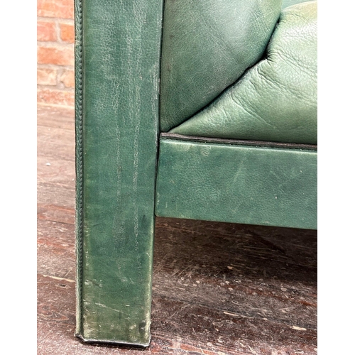 1311 - Good quality mid century Italian green leather sofa, with stylised shaped ends, 161cm long