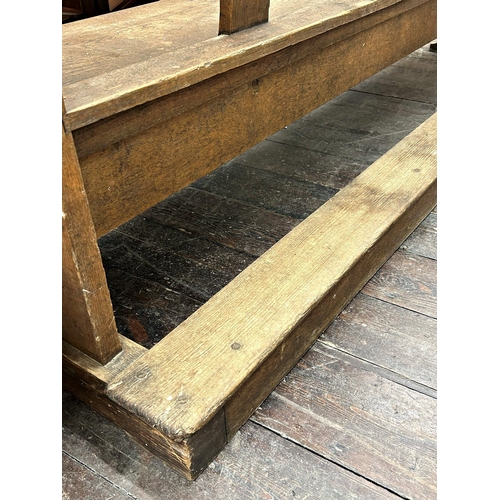 1337 - From The Elton John Biopic Film 'ROCKETMAN' - pair of oak pews, 210cm long (2)