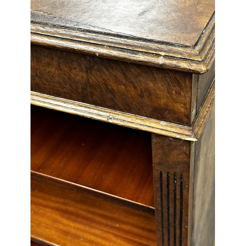 1448 - A pair of Georgian style walnut veneered dwarf bookcases, fitted shelves and fluted pilasters, each ... 