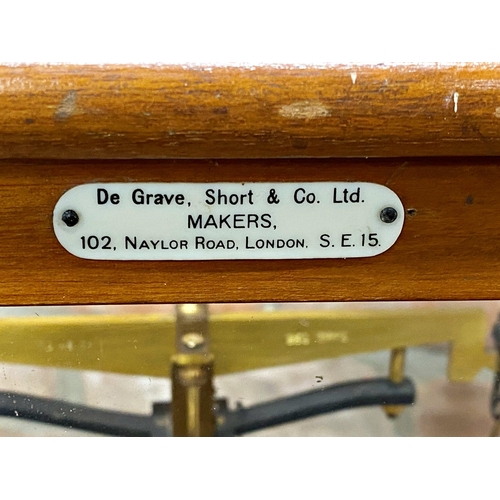 1108 - Teak glazed case of precision scales by De Grave Short & Co Ltd of London, 45cm wide