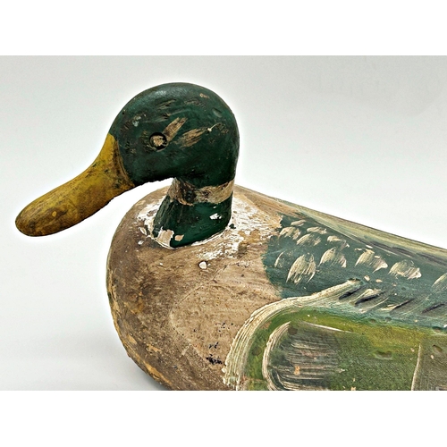 1142 - Victorian carved softwood decoy duck, with original paint, 38cm long x 21cm high