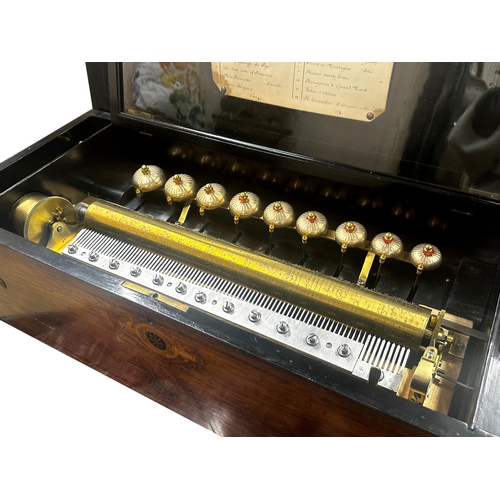 402 - Exceptional quality Swiss walnut cased Nine Bell music box, playing twelve airs, 79cm wide