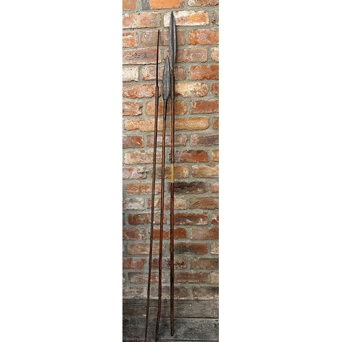 1079 - Tribal interest - three primitive made spears with wooden handle and metal spikes, the largest 160cm... 