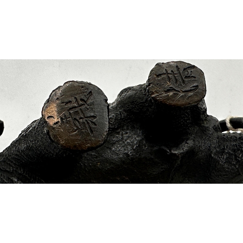 426 - Chinese bronze study of a standing elephant, inscribed calligraphy signature to feet, 11cm long