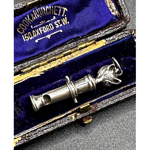 197 - Good novelty silver dog whistle mounted with a fox mask, 4.5cm long, cased