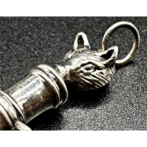 197 - Good novelty silver dog whistle mounted with a fox mask, 4.5cm long, cased