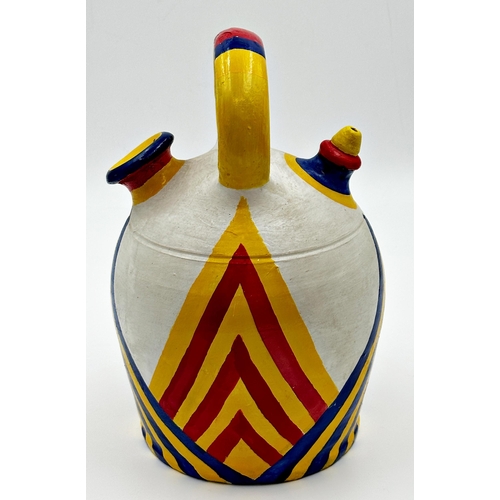 477 - Mid-century Inca style hand painted wine pot with indistinct makers stamp to the handle, 31cm high