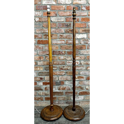 1127 - Tow similar turned beech standard lamps, each 155cm high (2)