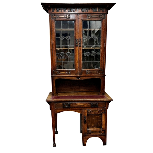 1195 - Liberty and co - Exceptional Arts and Crafts oak desk bookcase, the raise back carved 'By Nature Com... 