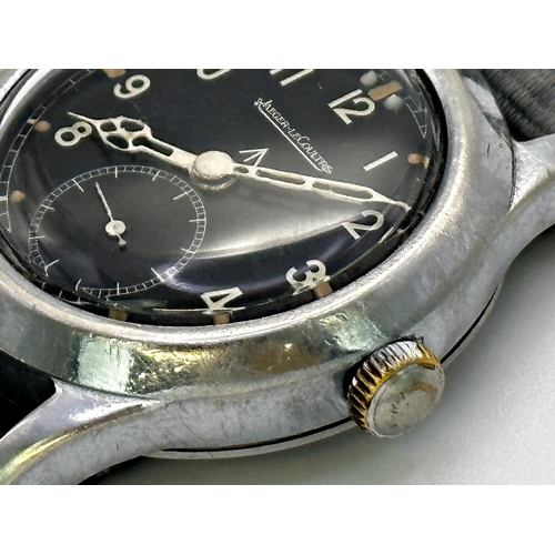 345 - A Gent's Jaeger-LeCoultre stainless steel 'Dirty Dozen' wristwatch, c.1945, the black dial with broa... 