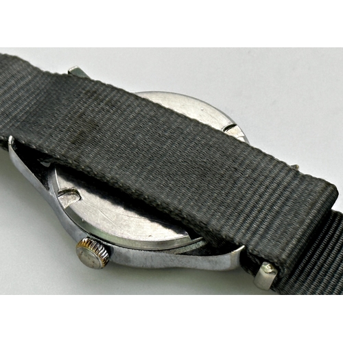 345 - A Gent's Jaeger-LeCoultre stainless steel 'Dirty Dozen' wristwatch, c.1945, the black dial with broa... 