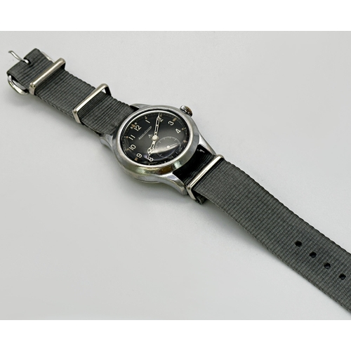 345 - A Gent's Jaeger-LeCoultre stainless steel 'Dirty Dozen' wristwatch, c.1945, the black dial with broa... 