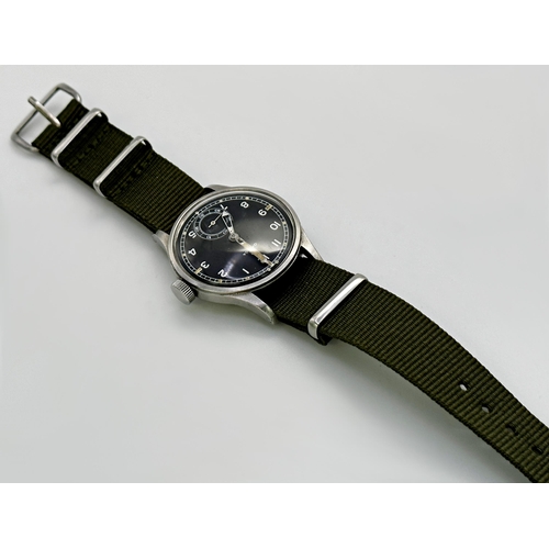 346 - A Gent's Omega H.S.10 Royal Navy Dive Supervisor's wristwatch, c.1945, the black dial with 'T' mark,... 