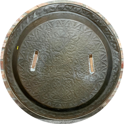 600 - Impressing massive Arts and Crafts brass charger, with geometric pokerwork decoration, 91cm diameter