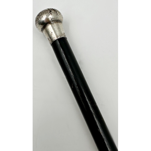 174 - A George V, ebonised silver knopped swagger stick, JP, London 1923, of tapering form 92cm