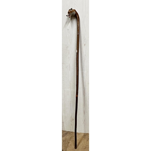 185 - Exceptional quality hand carved walking stick, with fox head knop, open mouth with teeth and glass e... 