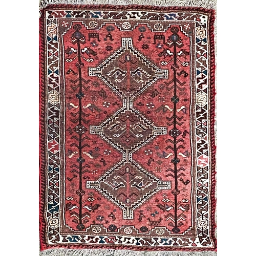 1419 - Afghan three medallion rug, red ground, 165 x 105cm