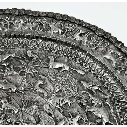 306 - Good Indian white metal twin handled tray, profusely embossed with an animal procession, to include ... 