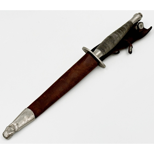 404 - WW2 1st pattern Fairbairn-Sykes Commando fighting knife. The hilt with nickel grip of chequered desi... 