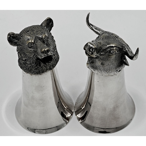 251 - Two silver plated novelty stirrup cups of a bear and a bull, each 14cm high