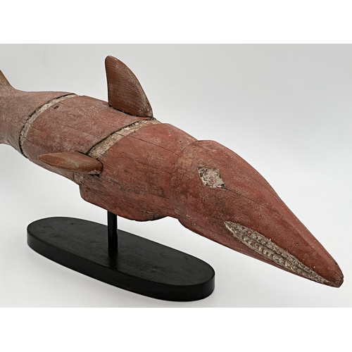 496 - Good carved wooden tribal Bozo fish, polychrome highlights, on stand, 76cm long