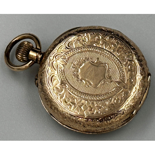 341 - A 14K gold pocket watch, gilt metal dial with Roman numerals, engraved floral motif and central cart... 